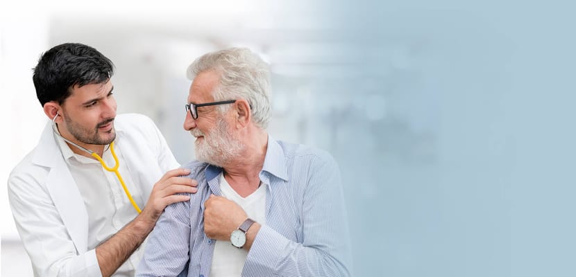 Healthcare professional interacting with a senior man