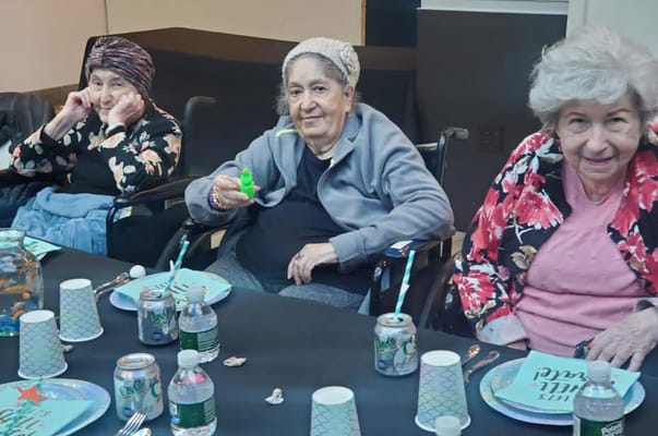 Residents enjoying snacks at a social gathering