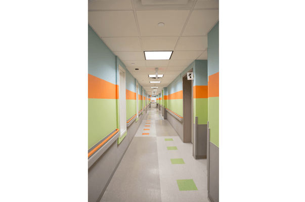 Brightly colored corridor inside a care facility