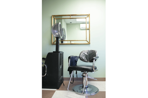 Hair salon station in facility interior