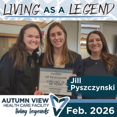 Staff members celebrating employee of the month