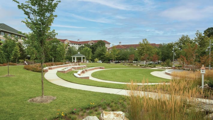 Beautifully landscaped outdoor space with seating areas
