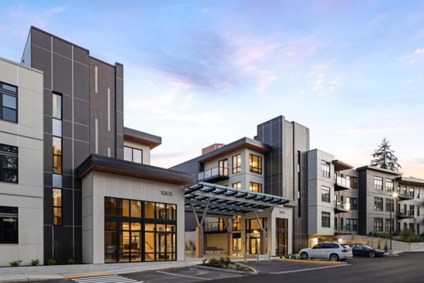 Exterior view of Emerald Heights building at sunset