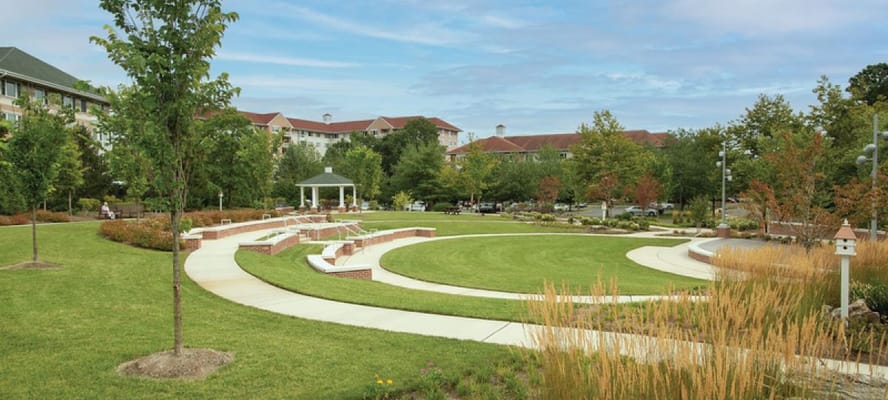 Spacious outdoor area with pathways and greenery