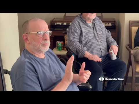 Residents engaging in conversation in a common area