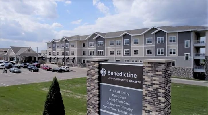 Exterior shot of Benedictine Manor with signage