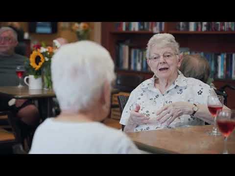 Residents engaging in conversation in a common area