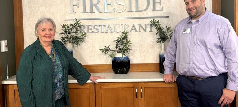 A resident and staff member at the Fireside Restaurant