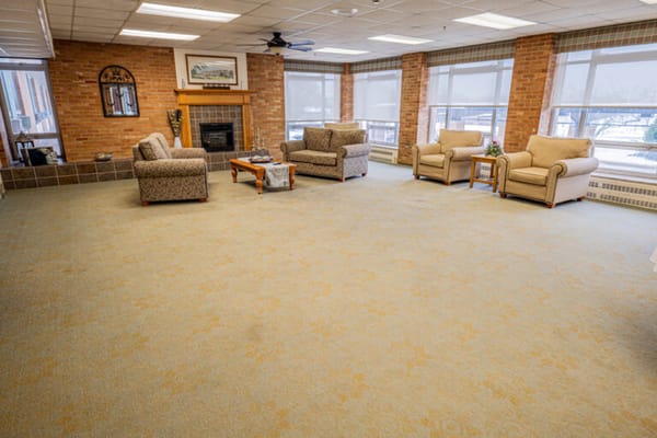 Cozy common area with comfortable seating and fireplace