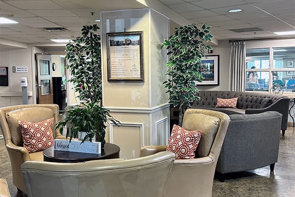 Common area with comfortable seating and plants