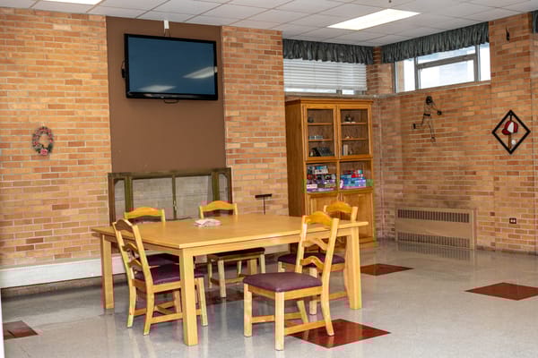 Interior common area with table and chairs