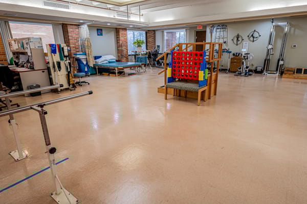 Interior view of a recreational therapy room with equipment