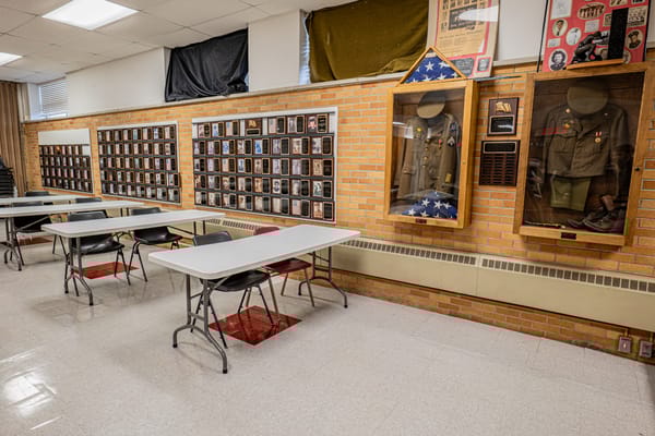 Interior view of a hall displaying veteran memorabilia