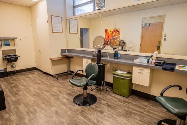 Interior photo of a salon space with styling chairs