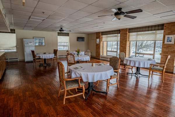 Dining area with tables set for meals