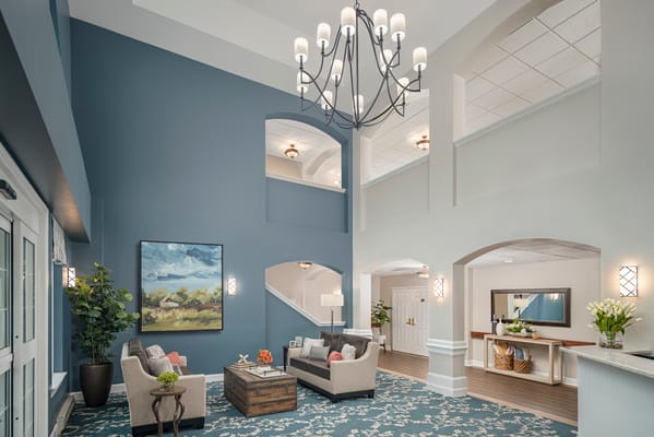 Bright interior common area with seating and art