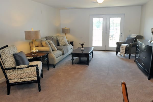 Cozy interior living space with sofa and chairs