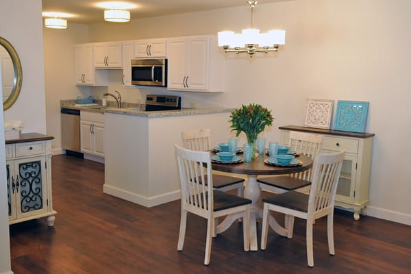 Bright interior dining area with a table set for a meal