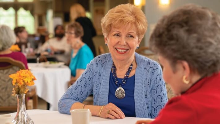 Residents enjoying conversation in a common area