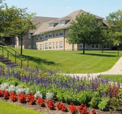 Exterior view of Concordia at Rebecca Residence with gardens