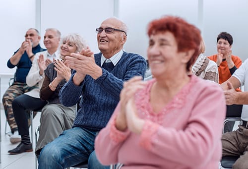 Residents enjoying a cheerful activity in a common area