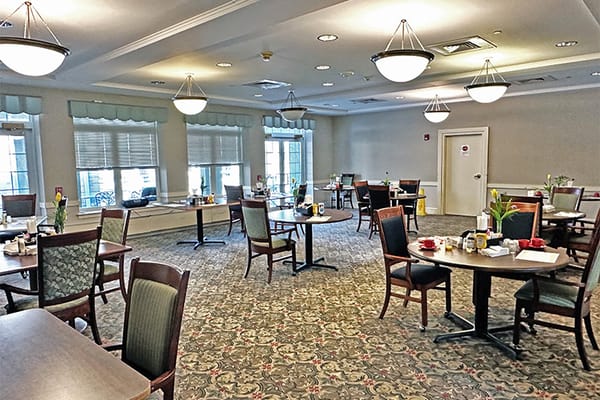 Dining room with tables set for meals