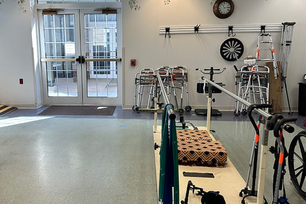 Activity room with mobility aids and natural light