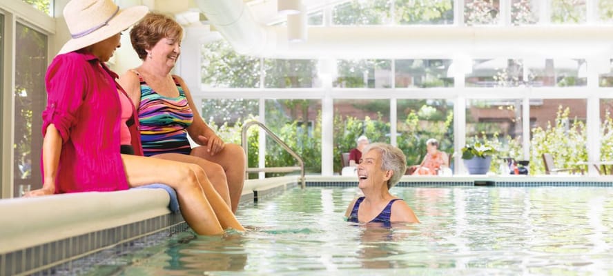Residents enjoying an indoor pool activity