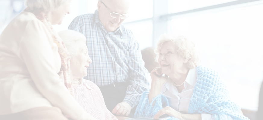 Residents engaged in conversation in a cozy common area