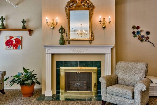 Cozy common area with a fireplace and seating