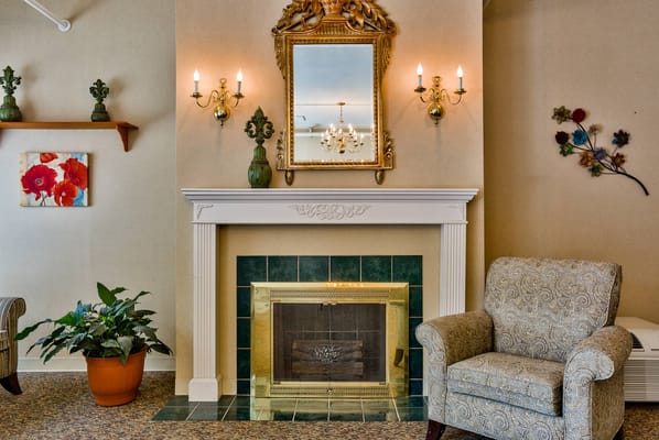Cozy common area with a fireplace and seating