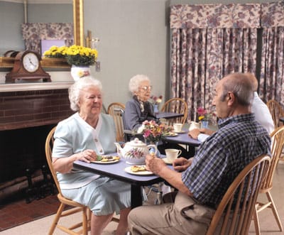 Residents enjoying tea in a dining room