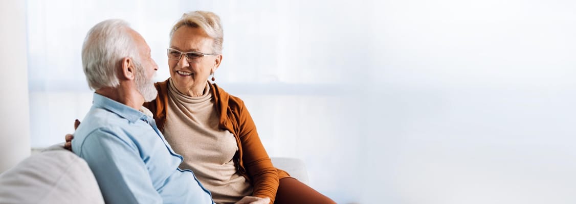 Couple enjoying a moment together in a cozy interior space