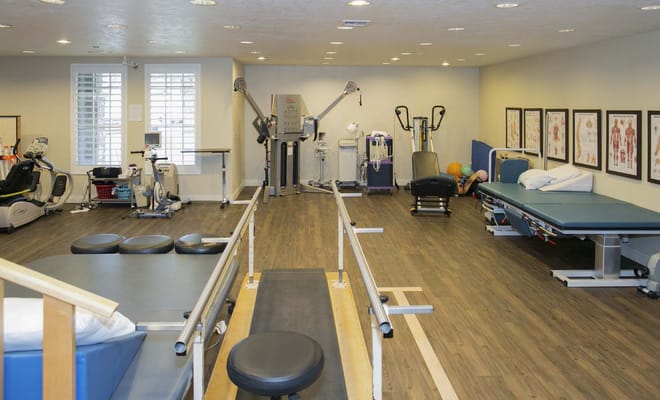 Interior view of a rehabilitation gym with equipment