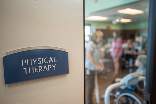 Residents participating in physical therapy session
