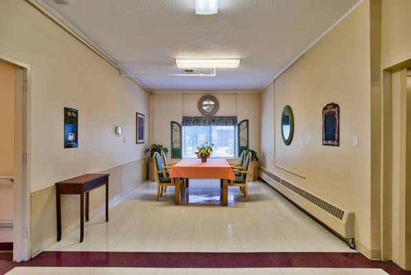Interior dining area with table and chairs