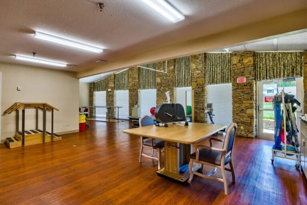 Interior therapy room with equipment and natural light