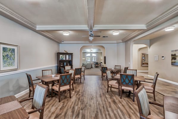 Common area with dining tables and chairs