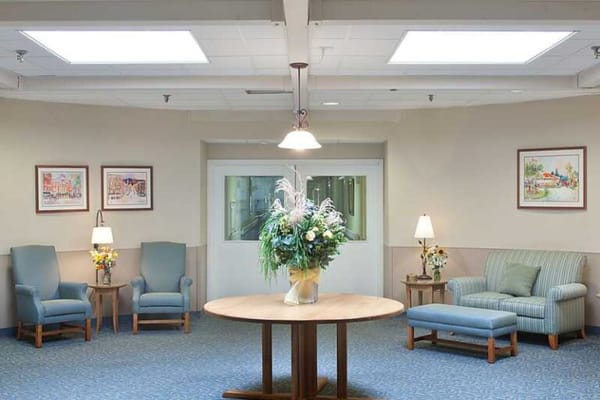 Interior common area of a nursing home with seating