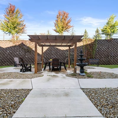 Outdoor shaded seating area with fountain