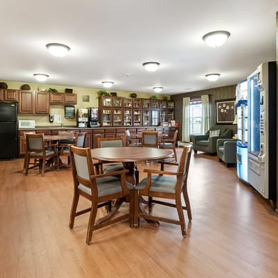 Bright common area with tables and chairs