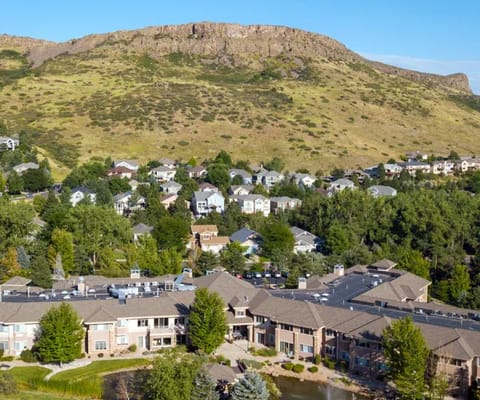 Aerial view of a senior living facility surrounded by nature
