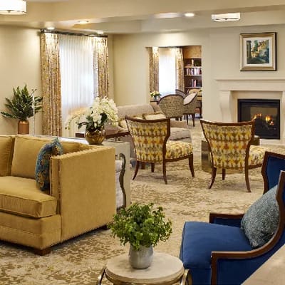 Cozy common area with seating and a fireplace