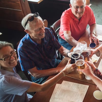 Residents enjoying drinks together at a social gathering