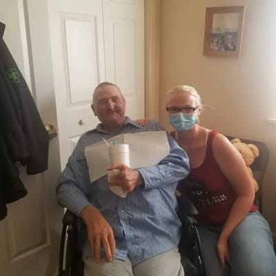 Resident and staff member in a private room