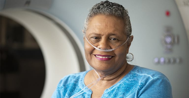 A senior woman with a smile in a healthcare setting