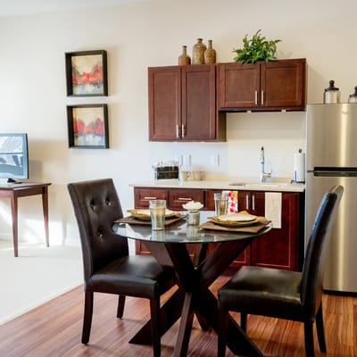 Cozy kitchen area with dining table and chairs