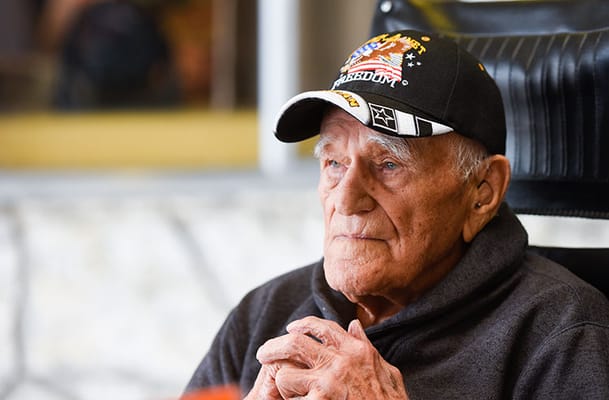 Senior resident in a thoughtful pose