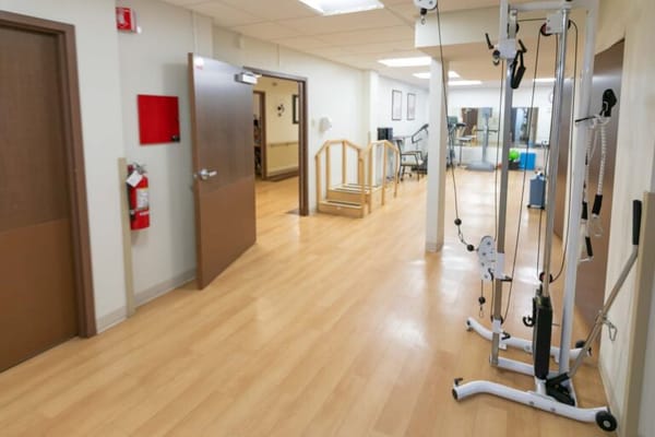 Interior view of a rehabilitation facility with exercise equipment