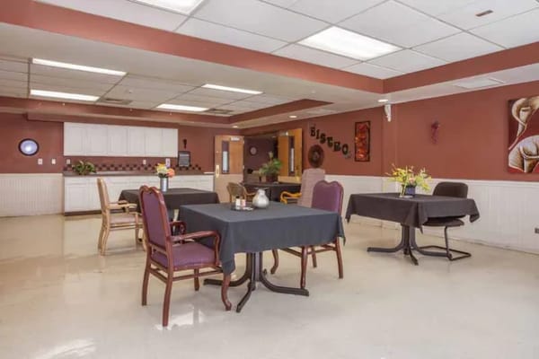 Interior dining area with tables and chairs